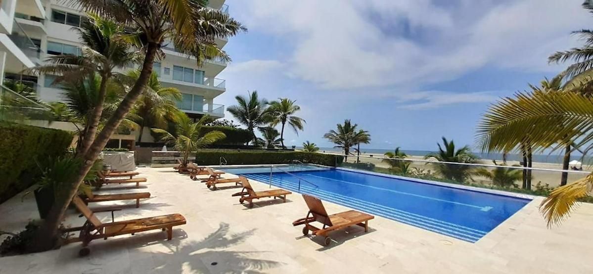 In Beachfront Building With Pools Near Historic Center